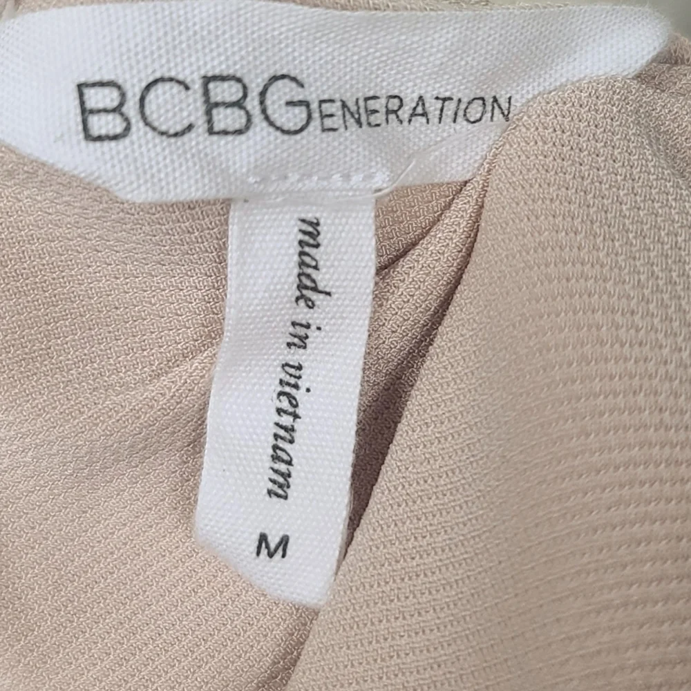 BCBGeneration V Neck Beige Sleeveless Romper M